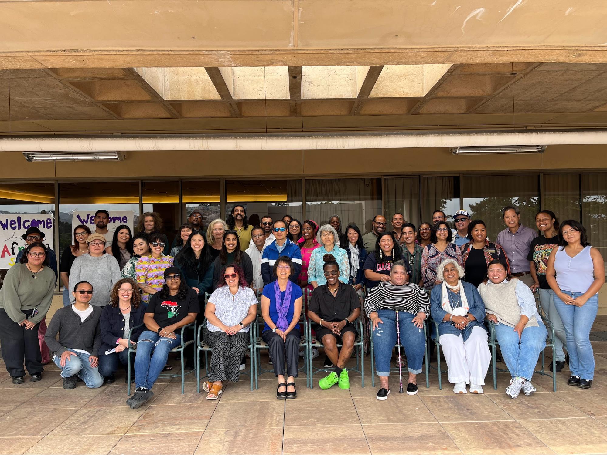 A group photo of staff and faculty in the college.