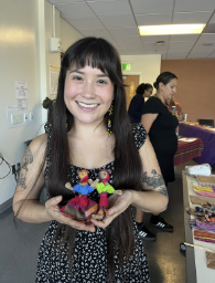 Leticia Hernandez holding a doll